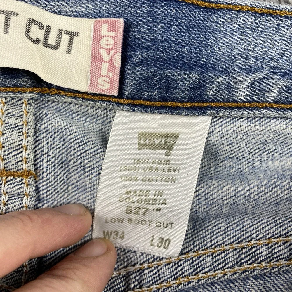 Levis 527 Low Boot Cut Jeans Mens 34x30 Blue Medium Wash Mid Rise Distressed Rip
